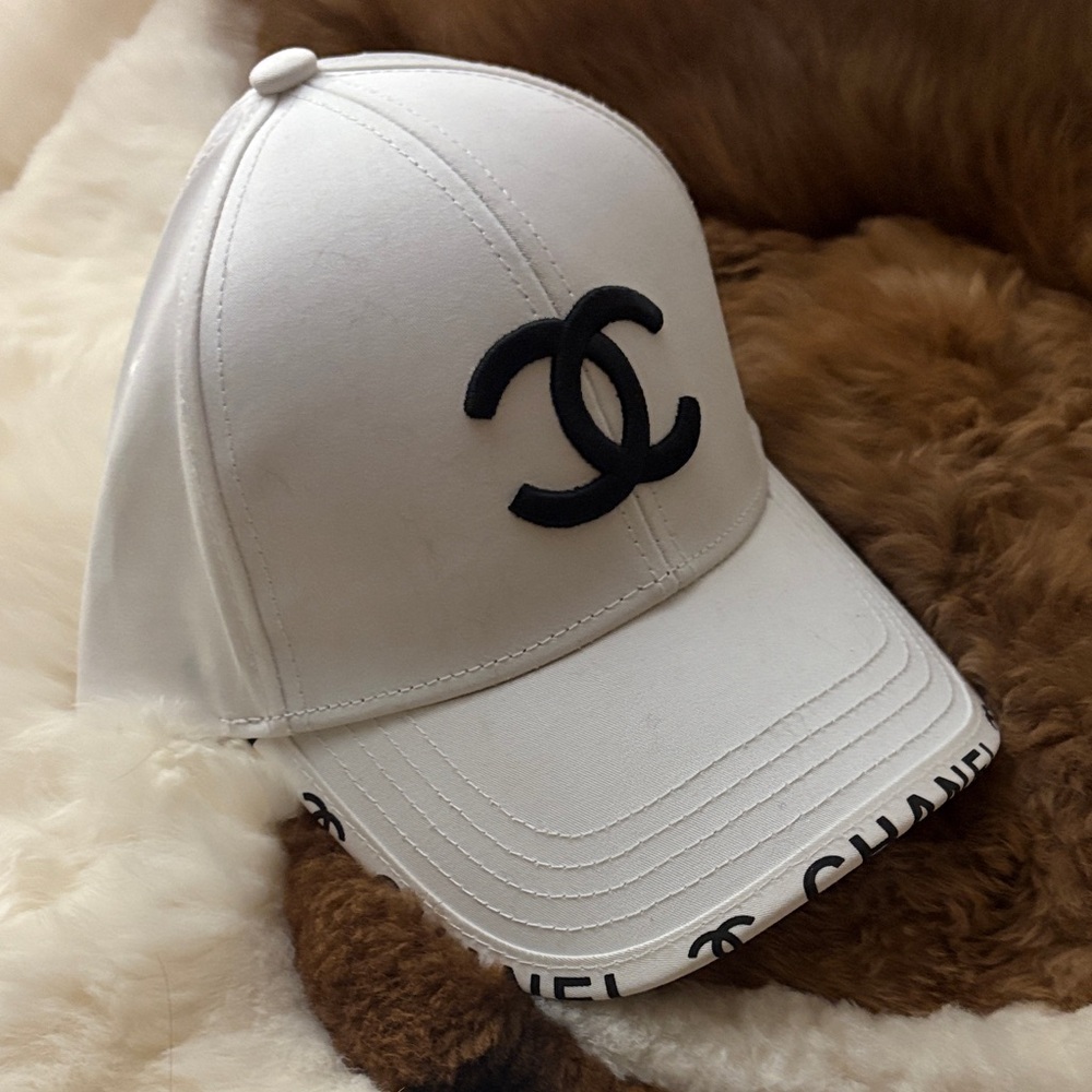 CHANEL White Hat with Black Emblem